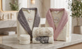 Bahar double bathrobe set with gray and pink satin collars, displayed with two embroidered towels